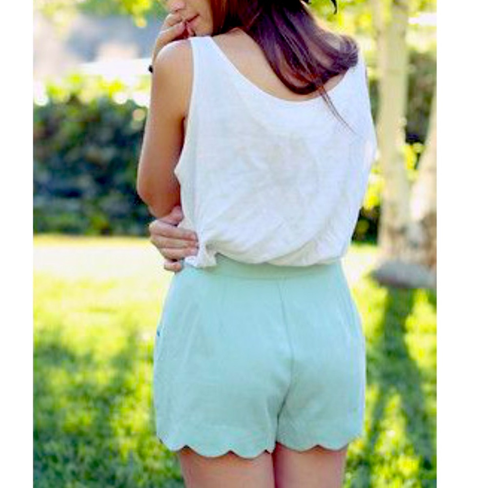 Green scalloped shorts